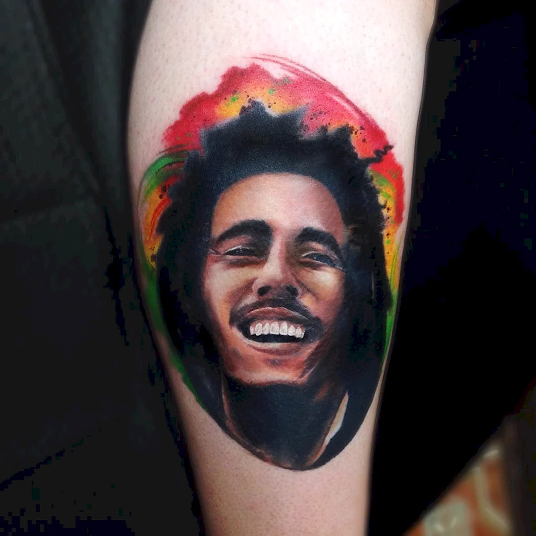 Hyper Realistic Tattoo of Bob Marley on Skateboard