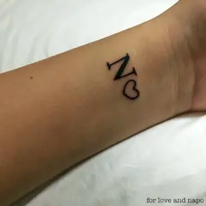 Тату буква n