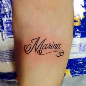Тату надпись Марина