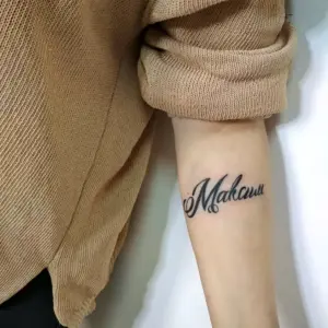 Тату с именем Максим на запястье